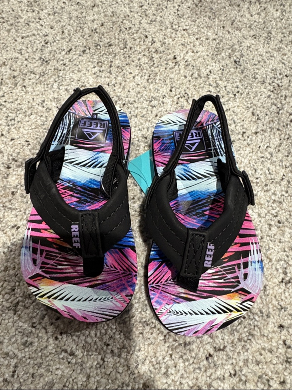 Reef Black-Strap Flip Flops with Pink & Blue Tropical Footbed